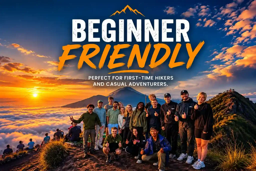 Mount Batur trekking guide helping international tourist during sunrise hike to summit