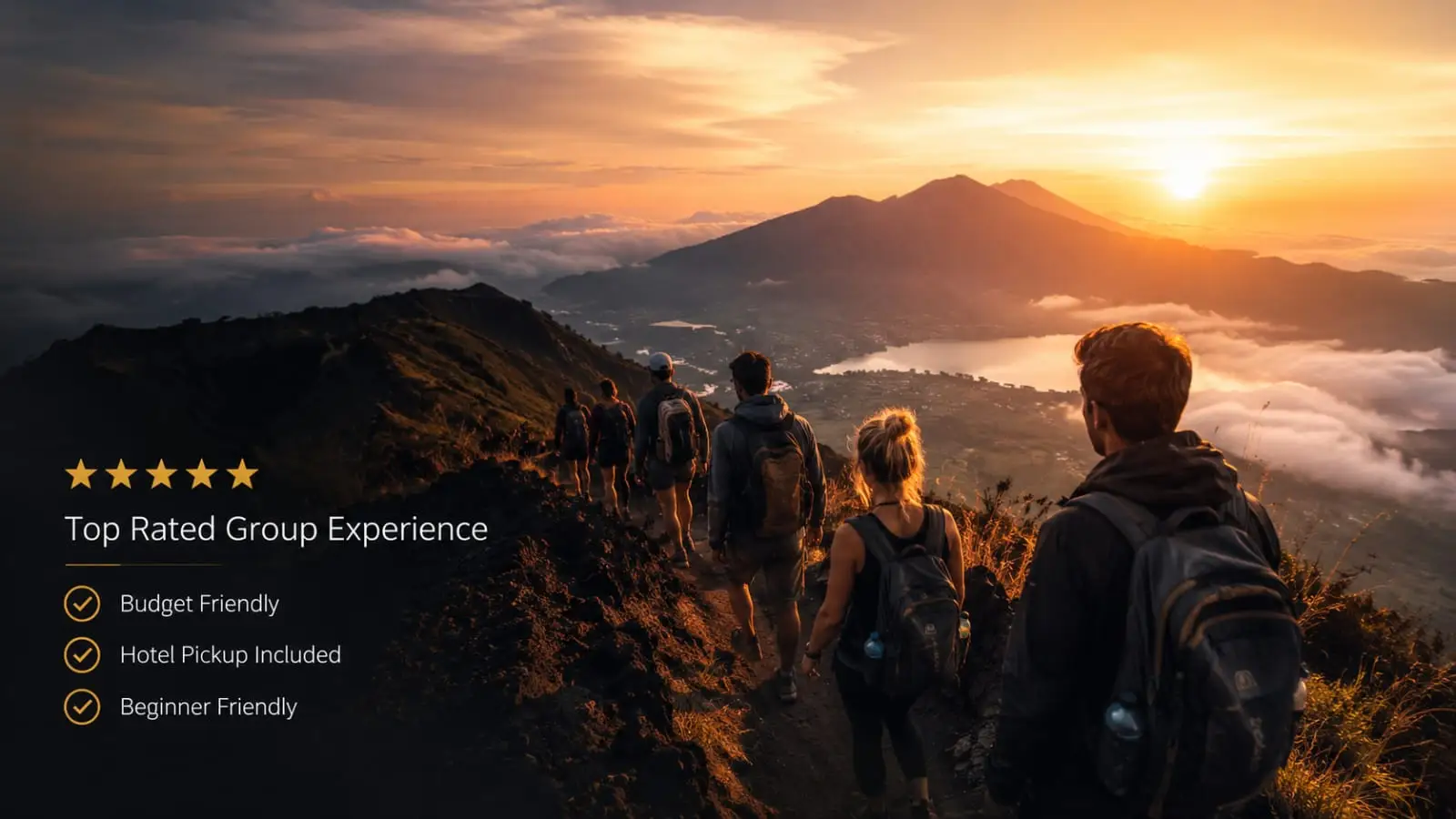 Mount Batur trekking group enjoying breakfast at summit with sunrise background